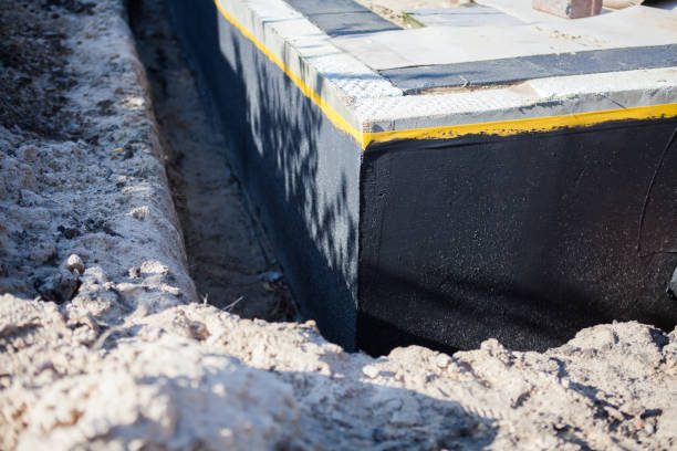 Professional Waterproofing technician working in Suwanee, GA